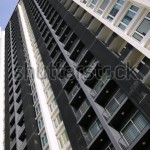 stock-photo-abstract-architecture-view-of-a-high-rise-tower-block-in-bangkok-58453954