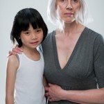 thai child and western woman